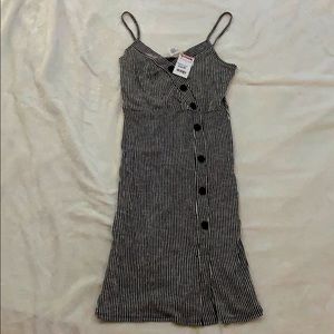 Black and white striped button-down mini dress